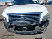 ✅ 2014 Infiniti QX80 • VIN: JN8AZ2NE9E9064040 • Lot: 43014644. Listed on IAAI with 141,766 mi. Free auction sales archive from the USA and detailed vehicle history report at DreamBid. Image 13.