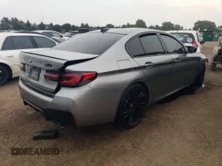 ✅ 2022 BMW M5 • VIN: WBS83CH07NCH79463 • Lot: 63313243. Wystawiony na Copart z przebiegiem 21 715 mil. Bezpłatny archiwum sprzedaży aukcyjnych z USA i szczegółowy raport historii pojazdu na DreamBid. Zdjęcie 3.
