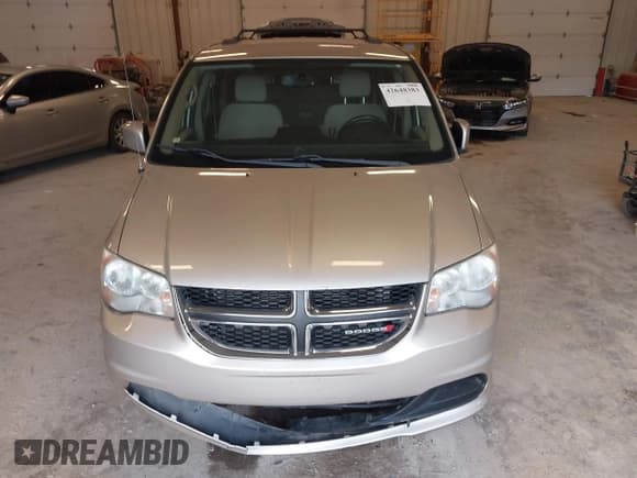 ✅ 2014 Dodge Grand Caravan SXT • VIN: 2C4RDGCG2ER105598 • Lot: 42648383. Listed on IAAI with 103,238 mi. Free auction sales archive from the USA and detailed vehicle history report at DreamBid. Image 12.