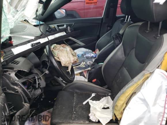 2016 Hyundai Veloster Turbo с VIN KMHTC6AE8GU268729, выставлен на аукционе Copart как лот 64152474 с пробегом Не указан миль и Списание • Salvage title. История ставок и продаж доступна на DreamBid. Изображение 7.