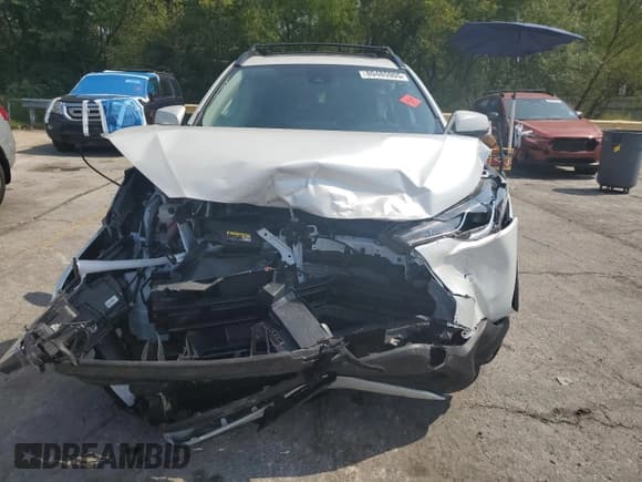 ✅ 2022 Toyota Corolla Cross LE • VIN: 7MUBAABG3NV042839 • Lot: 90418745. Listed on Copart with 10,386 mi. Free auction sales archive from the USA and detailed vehicle history report at DreamBid. Image 5.