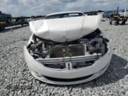 ✅ 2016 Lincoln MKZ • VIN: 3LN6L2G90GR623271 • Lot: 85845245. Wystawiony na Copart z przebiegiem 94 302 mil. Bezpłatny archiwum sprzedaży aukcyjnych z USA i szczegółowy raport historii pojazdu na DreamBid. Zdjęcie 5.