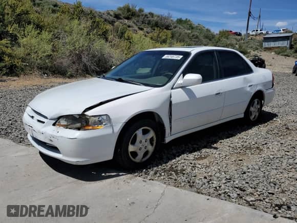 2000 Honda Accord EX with VIN JHMCG6677YC029245, listed as a Copart auction lot 56246735 with 185,384 mi miles and Salvage title. Bid and sale history available at DreamBid. Image 1.