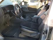 ✅ 1998 Honda Passport LX • VIN: 4S6CM58W0W4404170 • Lot: 83777484. Listed on Copart with 181,140 mi. Free auction sales archive from the USA and detailed vehicle history report at DreamBid. Image 7.