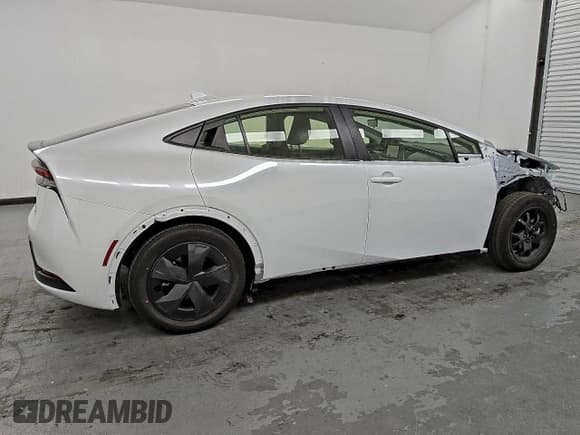 ✅ 2025 Toyota Prius LE • VIN: JTDACAAUXS3062249 • Lot: 91310765. Listed on Copart with 586 mi. Free auction sales archive from the USA and detailed vehicle history report at DreamBid. Image 3.