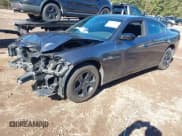 ✅ 2022 Dodge Charger SXT • VIN: 2C3CDXBG1NH239469 • Lot: 43579238. Listed on IAAI with 66,557 mi. Free auction sales archive from the USA and detailed vehicle history report at DreamBid. Image 2.