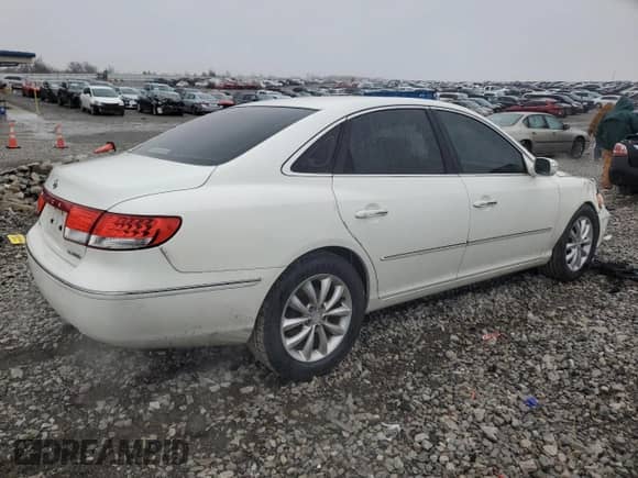 2007 Hyundai Azera SE z VIN KMHFC46F47A171001, wystawiony jako Copart lot #43953835 z przebiegiem 217 443 mil mil oraz Szkoda całkowita • Salvage title. Historia ofert i sprzedaży dostępna na DreamBid. Obrazek 3.