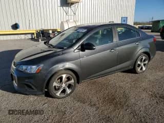 2020 Chevrolet Sonic Premier with VIN 1G1JF5SBXL4113104, listed as a Copart auction lot 90826455 with 104,634 mi miles and Clean title. Bid and sale history available at DreamBid. Image 1.