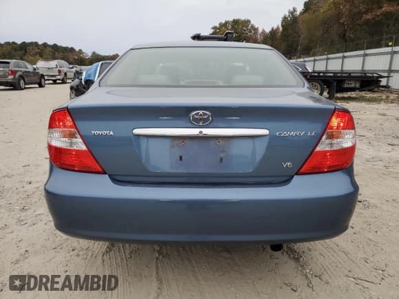 ✅ 2003 Toyota Camry LE • VIN: 4T1BF32K03U552498 • Lot: 89576465. Listed on Copart with 113,317 mi. Free auction sales archive from the USA and detailed vehicle history report at DreamBid. Image 6.
