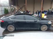 ✅ 2016 Ford Fusion Titanium • VIN: 3FA6P0K91GR135375 • Lot: 43865065. Listed on IAAI with 174,589 mi. Free auction sales archive from the USA and detailed vehicle history report at DreamBid. Image 13.