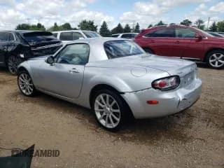 ✅ 2007 Mazda MX-5 Miata Grand Touring • VIN: JM1NC26F370137271 • Лот: 66772934. Опубликован ранее на Copart с пробегом 49 152 миль. Бесплатный доступ к архиву аукционных продаж из США и подробный отчёт об истории автомобиля на DreamBid. Изображение 2.