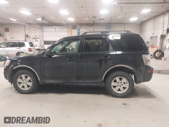 2010 Mercury Mariner with VIN 4M2CN9BG0AKJ06493, listed as a IAAI auction lot 41199173 with 143,631 mi miles and . Bid and sale history available at DreamBid. Image 12.