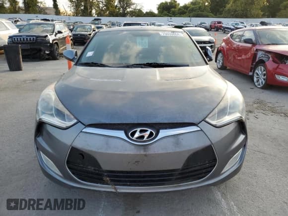 ✅ 2013 Hyundai Veloster w/Gray Int • VIN: KMHTC6AD9DU160820 • Lot: 70059004. Wystawiony na Copart z przebiegiem Nie podano. Bezpłatny archiwum sprzedaży aukcyjnych z USA i szczegółowy raport historii pojazdu na DreamBid. Zdjęcie 5.