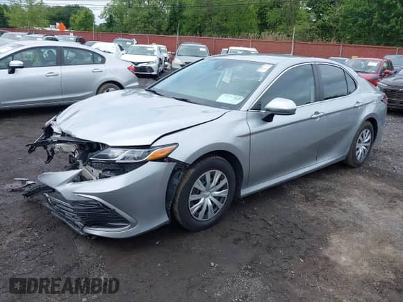 2022 Toyota Camry Hybrid LE z VIN 4T1C31AK4NU588863, wystawiony jako IAAI lot #42375893 z przebiegiem 218 285 mil mil oraz . Historia ofert i sprzedaży dostępna na DreamBid. Obrazek 19.