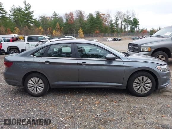 ✅ 2019 Volkswagen Jetta S • VIN: 3VWC57BU5KM233960 • Lot: 43568518. Listed on IAAI with 76,971 mi. Free auction sales archive from the USA and detailed vehicle history report at DreamBid. Image 13.