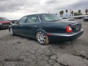 ✅ 2005 Jaguar XJ 8 LWB • VIN: SAJWA79C65SG34572 • Лот: 93790045. Опубликован ранее на Copart с пробегом 148 958 миль. Бесплатный доступ к архиву аукционных продаж из США и подробный отчёт об истории автомобиля на DreamBid. Изображение 2.