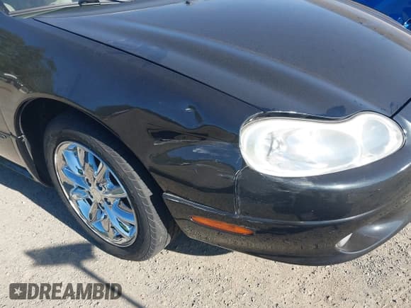 ✅ 2004 Chrysler Concorde Limited • VIN: 2C3HD56G34H695881 • Lot: 42853067. Listed on IAAI with 123,759 mi. Free auction sales archive from the USA and detailed vehicle history report at DreamBid. Image 6.