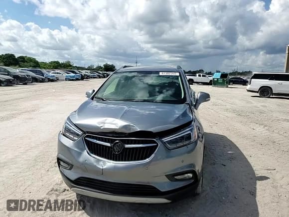 ✅ 2019 Buick Encore Essence • VIN: KL4CJCSM8KB919600 • Lot: 87382355. Listed on Copart with 28,176 mi. Free auction sales archive from the USA and detailed vehicle history report at DreamBid. Image 14.