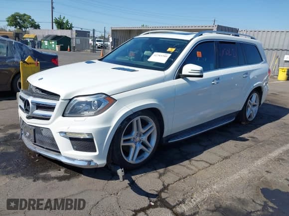 ✅ 2013 Mercedes-Benz GL 550 • VIN: 4JGDF7DE8DA239936 • Lot: 42703205. Listed on IAAI with 149,286 mi. Free auction sales archive from the USA and detailed vehicle history report at DreamBid. Image 2.