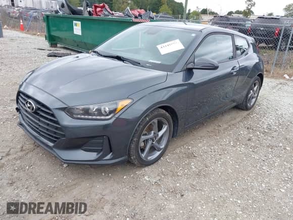 2019 Hyundai Veloster 2.0 with VIN KMHTG6AF5KU006205, listed as a IAAI auction lot 43445594 with 94,672 mi miles and . Bid and sale history available at DreamBid. Image 2.