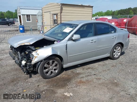 ✅ 2008 Kia Optima EX • VIN: KNAGE124X85233451 • Lot: 41706304. Listed on IAAI with 236,582 mi. Free auction sales archive from the USA and detailed vehicle history report at DreamBid. Image 2.