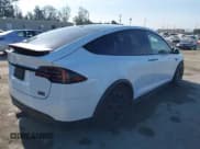 ✅ 2022 Tesla Model X Plaid • VIN: 7SAXCBE63NF337529 • Lot: 42066904. Wystawiony na IAAI z przebiegiem 56 933 mil. Bezpłatny archiwum sprzedaży aukcyjnych z USA i szczegółowy raport historii pojazdu na DreamBid. Zdjęcie 4.