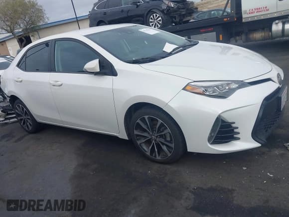 ✅ 2018 Toyota Corolla LE • VIN: 5YFBURHE8JP787045 • Lot: 43715533. Listed on IAAI with 105,003 mi. Free auction sales archive from the USA and detailed vehicle history report at DreamBid. Image 14.