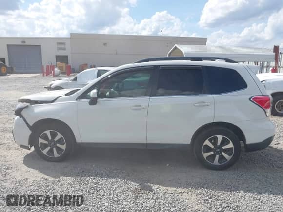 2017 Subaru Forester Limited with VIN JF2SJAJC1HH414553, listed as a IAAI auction lot 43289933 with 120,913 mi miles and . Bid and sale history available at DreamBid. Image 14.