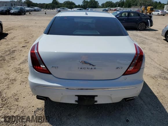 ✅ 2013 Jaguar XJ • VIN: SAJWA1C7XD8V55164 • Лот: 80382115. Опубликован ранее на Copart с пробегом 69 465 миль. Бесплатный доступ к архиву аукционных продаж из США и подробный отчёт об истории автомобиля на DreamBid. Изображение 6.