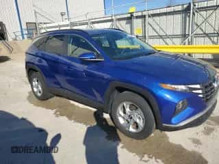 2023 Hyundai Tucson SEL with VIN 5NMJBCAEXPH161685, listed as a Copart auction lot 87441155 with 51,147 mi miles and Salvage title. Bid and sale history available at DreamBid. Image 4.