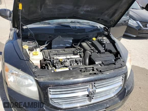 2009 Dodge Caliber SXT с VIN 1B3HB48AX9D209500, выставлен на аукционе Copart как лот 49409854 с пробегом 150 773 миль миль и Списание • Salvage title. История ставок и продаж доступна на DreamBid. Изображение 11.