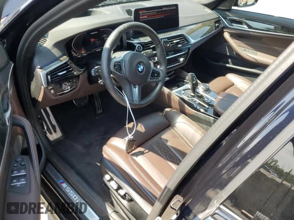 ✅ 2023 BMW 5 Series M550i xDrive • VIN: WBA13BK09PCN67527 • Lot: 65995475. Listed on Copart with 32,558 mi. Free auction sales archive from the USA and detailed vehicle history report at DreamBid. Image 8.