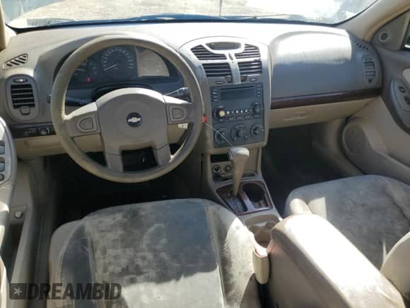 2005 Chevrolet Malibu LS z VIN 1G1ZT52825F231915, wystawiony jako Copart lot #77002194 z przebiegiem 327 023 mil mil oraz Szkoda całkowita • Salvage title. Historia ofert i sprzedaży dostępna na DreamBid. Obrazek 8.