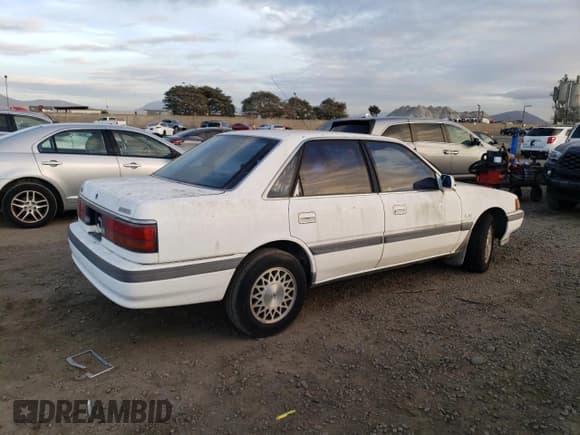 ✅ 1992 Mazda 626 • VIN: 1YVGD22B7N5214355 • Лот: 86899014. Опубликован ранее на Copart с пробегом 89 811 миль. Бесплатный доступ к архиву аукционных продаж из США и подробный отчёт об истории автомобиля на DreamBid. Изображение 3.
