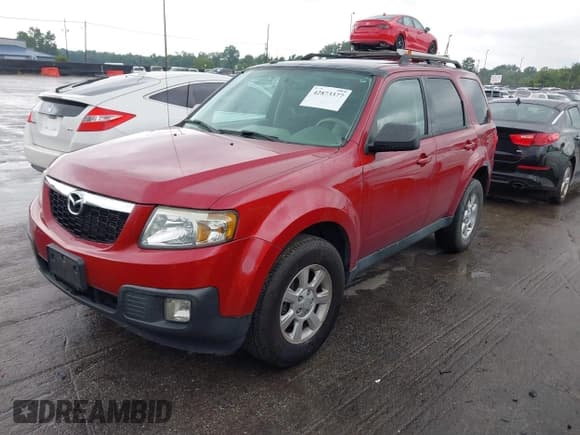 ✅ 2011 Mazda Tribute Grand Touring • VIN: 4F2CY9GG3BKM00770 • Lot: 42873377. Listed on IAAI with 131,821 mi. Free auction sales archive from the USA and detailed vehicle history report at DreamBid. Image 2.
