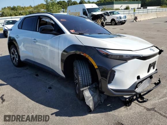 ✅ 2023 Toyota bZ4X XLE • VIN: JTMABACA7PA031081 • Lot: 80805895. Listed on Copart with 33,572 mi. Free auction sales archive from the USA and detailed vehicle history report at DreamBid. Image 4.