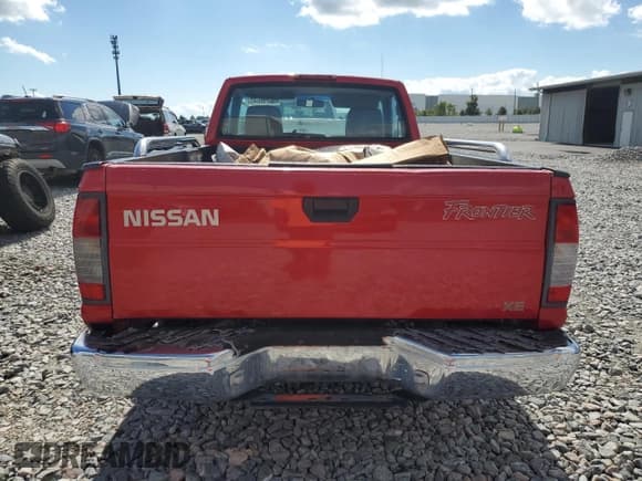 ✅ 1998 Nissan Frontier XE • VIN: 1N6DD21S2WC332138 • Lot: 90288645. Listed on Copart with 131,093 mi. Free auction sales archive from the USA and detailed vehicle history report at DreamBid. Image 6.