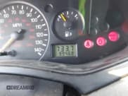 ✅ 2003 Ford Focus LX • VIN: 1FAFP33PX3W241880 • Lot: 42564941. Wystawiony na IAAI z przebiegiem 99 468 mil. Bezpłatny archiwum sprzedaży aukcyjnych z USA i szczegółowy raport historii pojazdu na DreamBid. Zdjęcie 7.