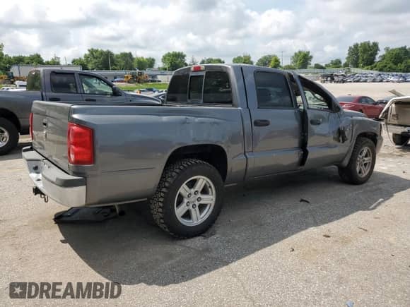 2007 Dodge Dakota ST с VIN 1D7HW28K87S263585, выставлен на аукционе Copart как лот 60899585 с пробегом 79 877 миль миль и Списание • Salvage title. История ставок и продаж доступна на DreamBid. Изображение 3.