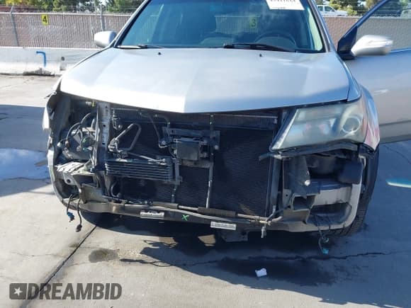 ✅ 2012 Acura MDX Advance • VIN: 2HNYD2H82CH518148 • Лот: 43411614. Опубликован ранее на IAAI с пробегом 140 449 миль. Бесплатный доступ к архиву аукционных продаж из США и подробный отчёт об истории автомобиля на DreamBid. Изображение 6.