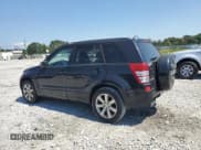 ✅ 2012 Suzuki Grand Vitara Limited • VIN: JS3TE0D74C4100509 • Lot: 81126405. Listed on Copart with 137,883 mi. Free auction sales archive from the USA and detailed vehicle history report at DreamBid. Image 2.