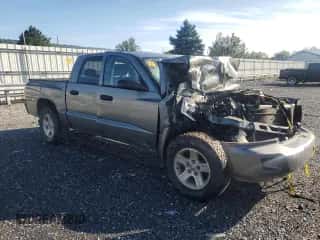 2010 Dodge Dakota Bighorn/Lonestar с VIN 1D7CE3GK0AS228194, выставлен на аукционе Copart как лот 67747754 с пробегом 163 139 миль миль и Списание • Salvage title. История ставок и продаж доступна на DreamBid. Изображение 4.
