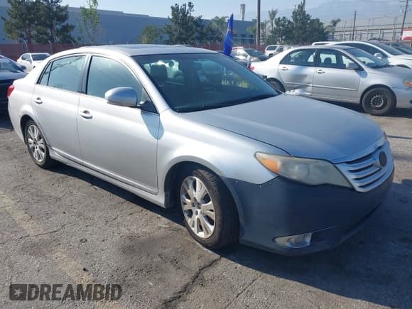 ✅ 2012 Toyota Avalon • VIN: 4T1BK3DB4CU455166 • Lot: 41867122. Listed on IAAI with 312,740 mi. Free auction sales archive from the USA and detailed vehicle history report at DreamBid. Image 1.
