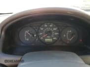 ✅ 2000 Mazda Protege DX • VIN: JM1BJ2220Y0239835 • Lot: 80228864. Wystawiony na Copart z przebiegiem 200 936 mil. Bezpłatny archiwum sprzedaży aukcyjnych z USA i szczegółowy raport historii pojazdu na DreamBid. Zdjęcie 9.