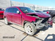 ✅ 2015 Jeep Grand Cherokee Summit • VIN: 1C4RJEJG9FC100568 • Lot: 42512705. Listed on IAAI with 128,413 mi. Free auction sales archive from the USA and detailed vehicle history report at DreamBid. Image 1.