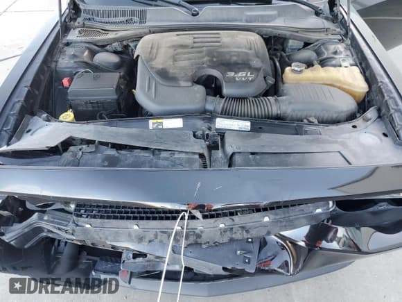 ✅ 2013 Dodge Challenger SXT • VIN: 2C3CDYAG2DH670263 • Lot: 86909704. Wystawiony na Copart z przebiegiem 121 614 mil. Bezpłatny archiwum sprzedaży aukcyjnych z USA i szczegółowy raport historii pojazdu na DreamBid. Zdjęcie 11.