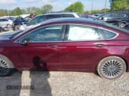 ✅ 2017 Ford Fusion Titanium • VIN: 3FA6P0D90HR231500 • Lot: 42220802. Listed on IAAI with 104,041 mi. Free auction sales archive from the USA and detailed vehicle history report at DreamBid. Image 14.