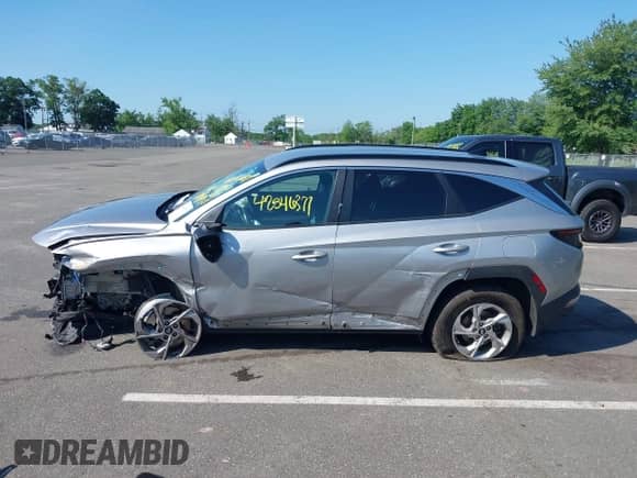 2022 Hyundai Tucson SEL with VIN KM8JBCAEXNU170081, listed as a IAAI auction lot 42546377 with 59,745 mi miles and . Bid and sale history available at DreamBid. Image 14.