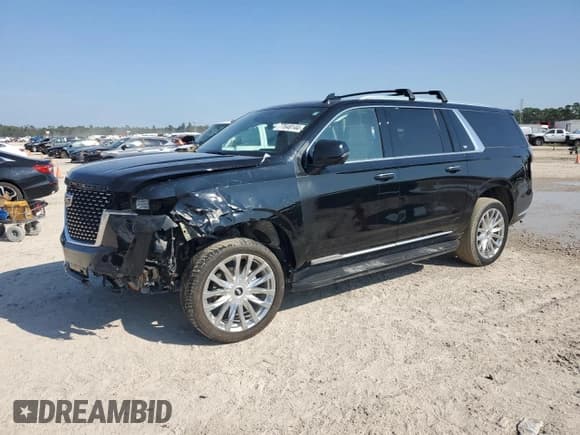 ✅ 2023 Cadillac Escalade ESV RWD Premium Luxury • VIN: 1GYS3KKL3PR106736 • Лот: 77648144. Опубликован ранее на Copart с пробегом 47 491 миль. Бесплатный доступ к архиву аукционных продаж из США и подробный отчёт об истории автомобиля на DreamBid. Изображение 1.