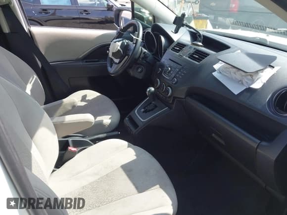 ✅ 2012 Mazda 5 Touring • VIN: JM1CW2CL2C0125776 • Lot: 42496258. Wystawiony na IAAI z przebiegiem 130 522 mil. Bezpłatny archiwum sprzedaży aukcyjnych z USA i szczegółowy raport historii pojazdu na DreamBid. Zdjęcie 5.